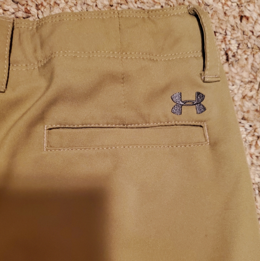 Under Armour Youth Medium Kahki loose fitted shorts, few blemished, as pictured.